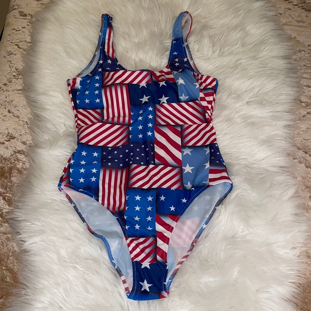 New never worn patriotic American flag one piece bathing suit